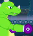 The green dino with a purple boxing glove